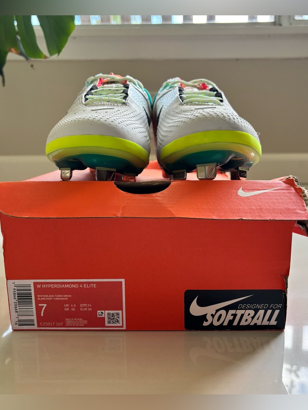 Nike White Softball Cleats with Neon Yellow and Teal Accents